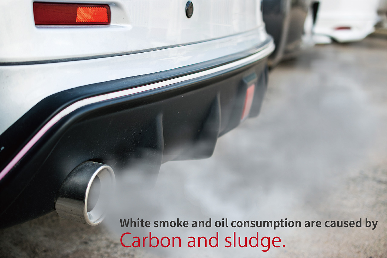 White smoke and oil consumption are caused by Carbon and sludge.